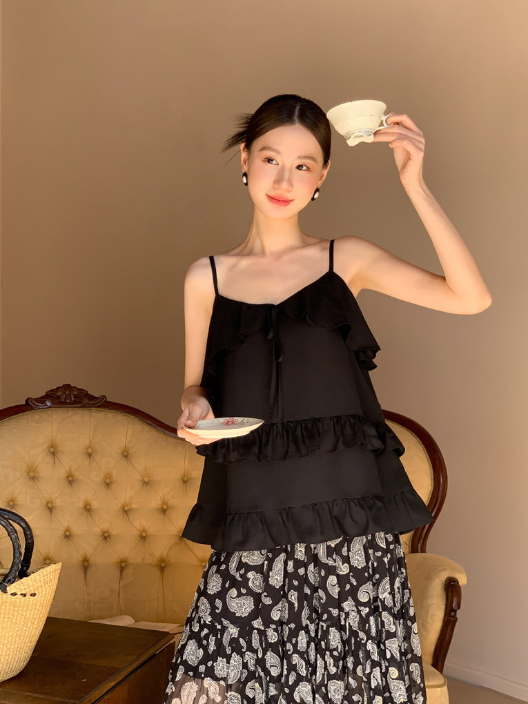 Black ruffled camisole and patterned maxi skirt