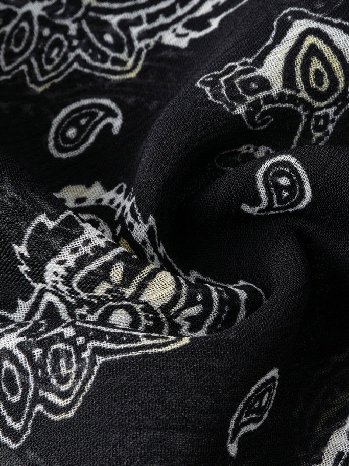 Black ruffled camisole and patterned maxi skirt