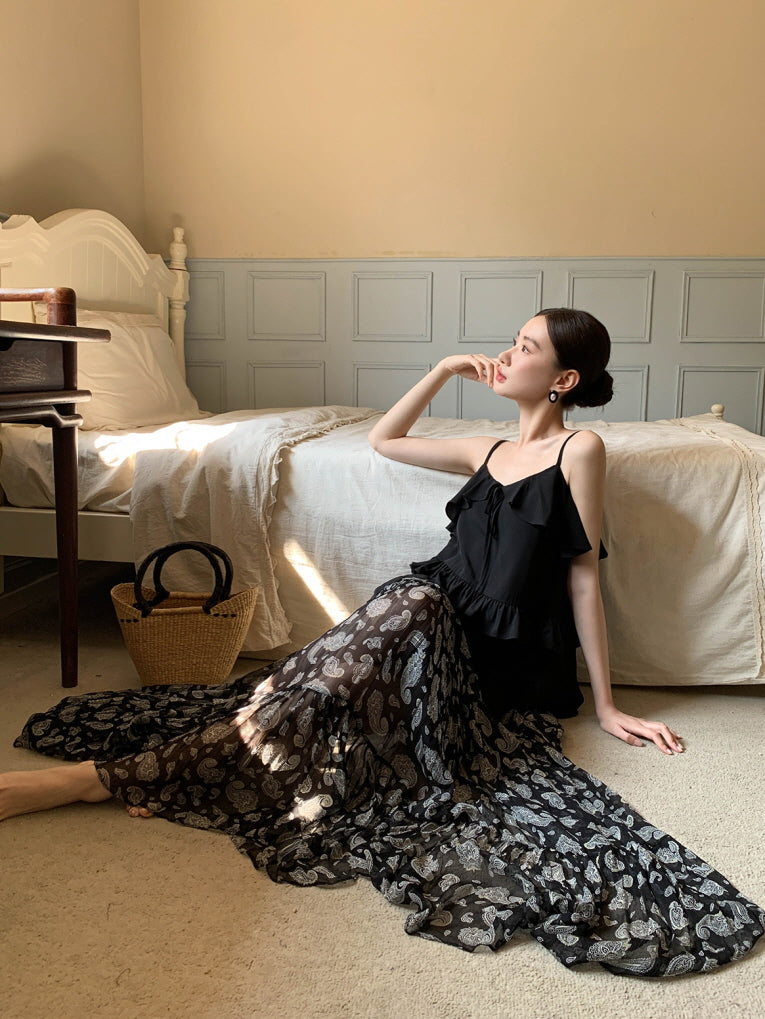 Black ruffled camisole and patterned maxi skirt
