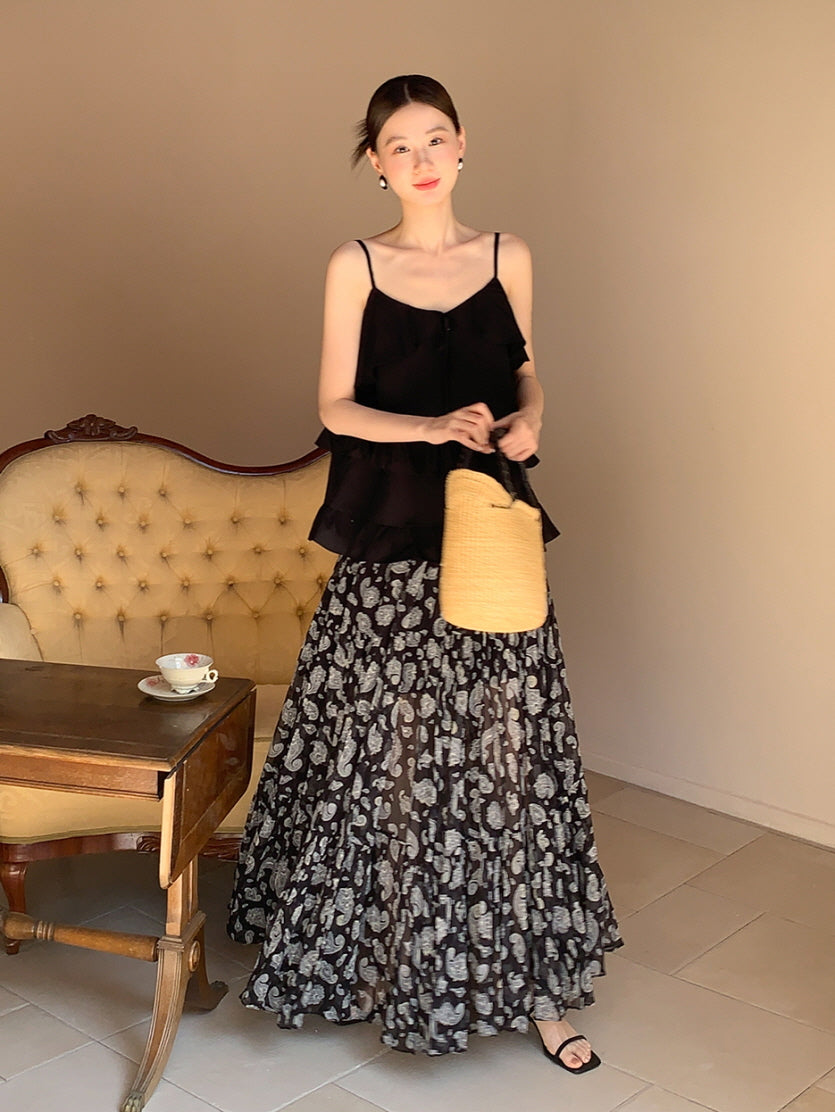 Black ruffled camisole and patterned maxi skirt