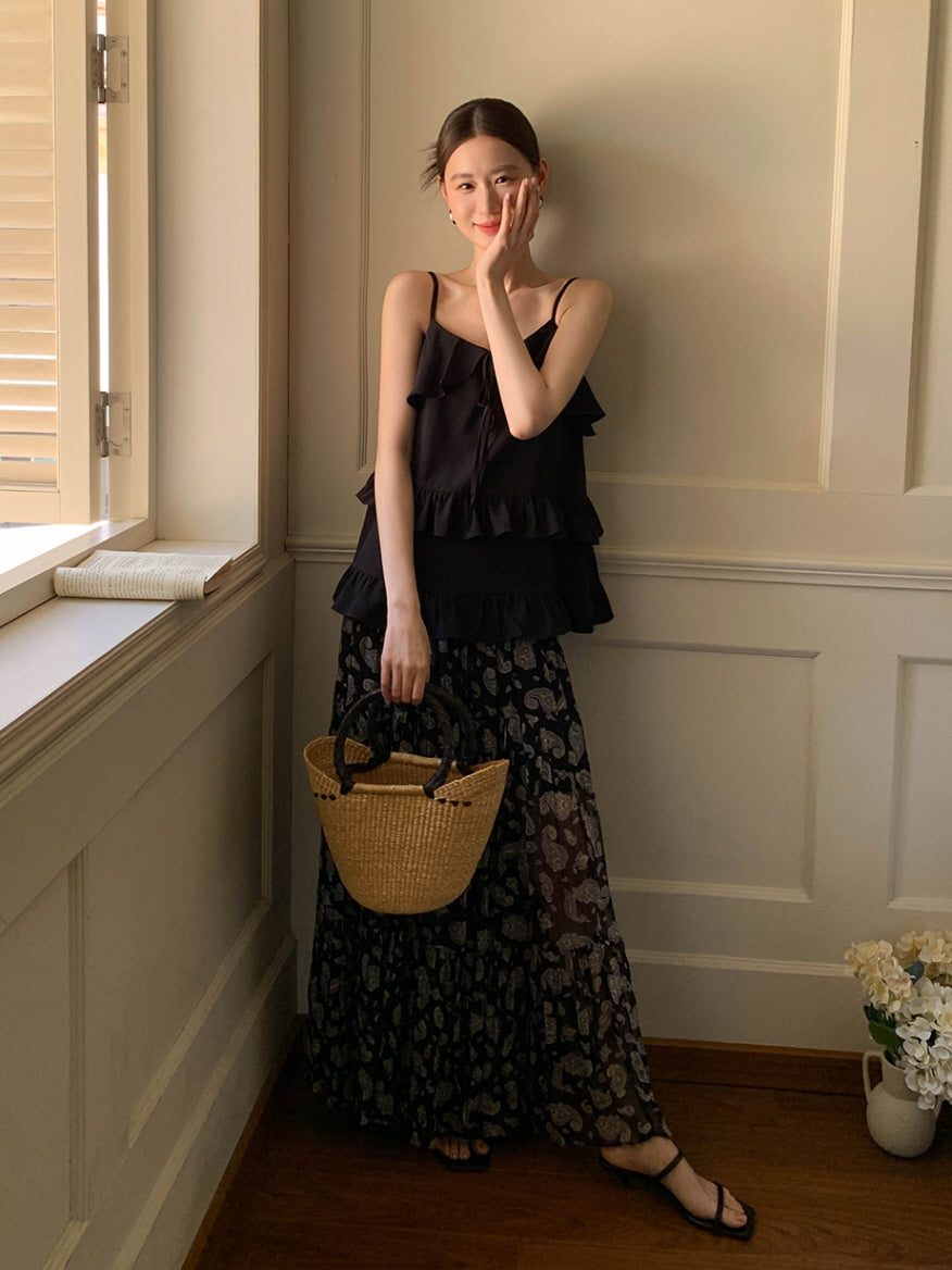 Black ruffled camisole and patterned maxi skirt
