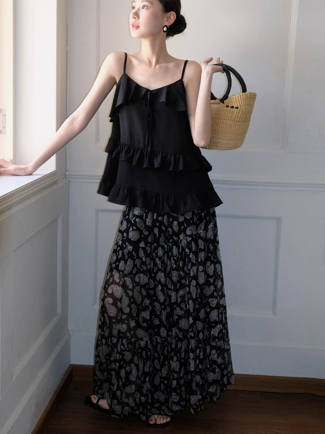 Black ruffled camisole and patterned maxi skirt