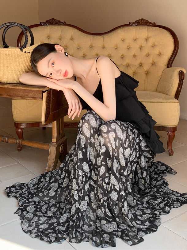 Black ruffled camisole and patterned maxi skirt