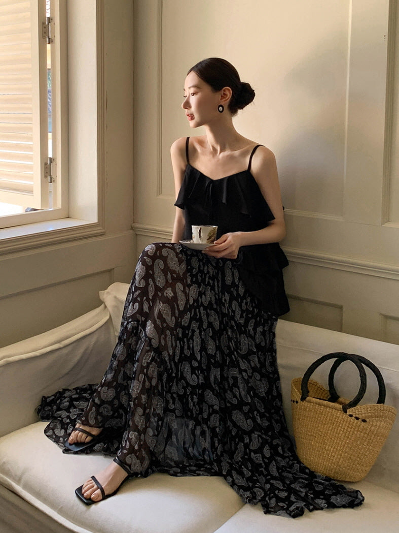Black ruffled camisole and patterned maxi skirt