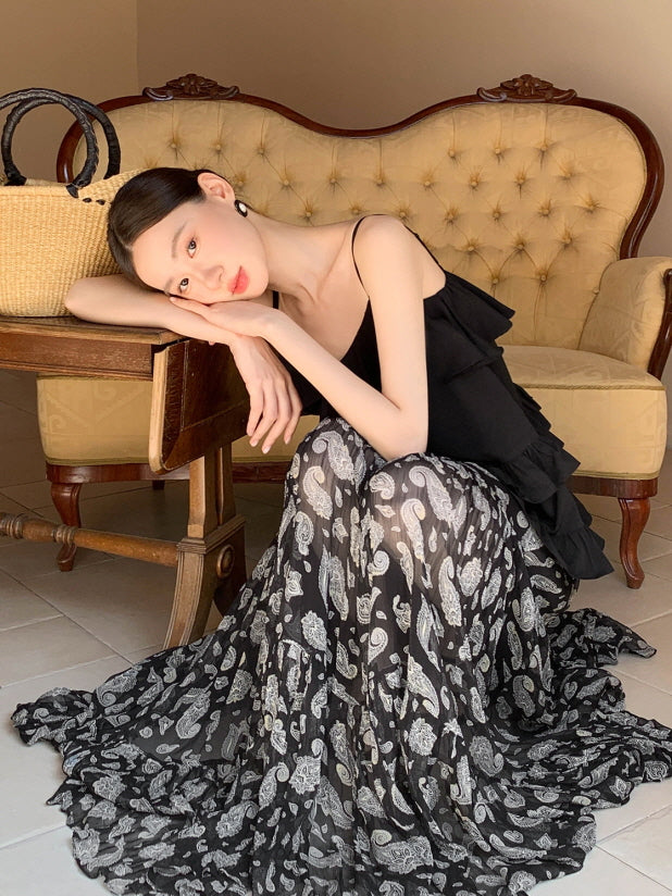 Black ruffled camisole and patterned maxi skirt