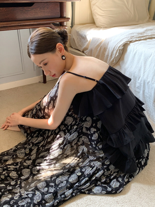 Black ruffled camisole and patterned maxi skirt