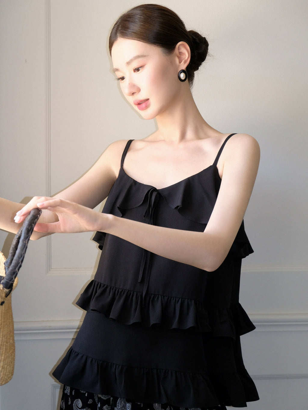 Black ruffled camisole and patterned maxi skirt