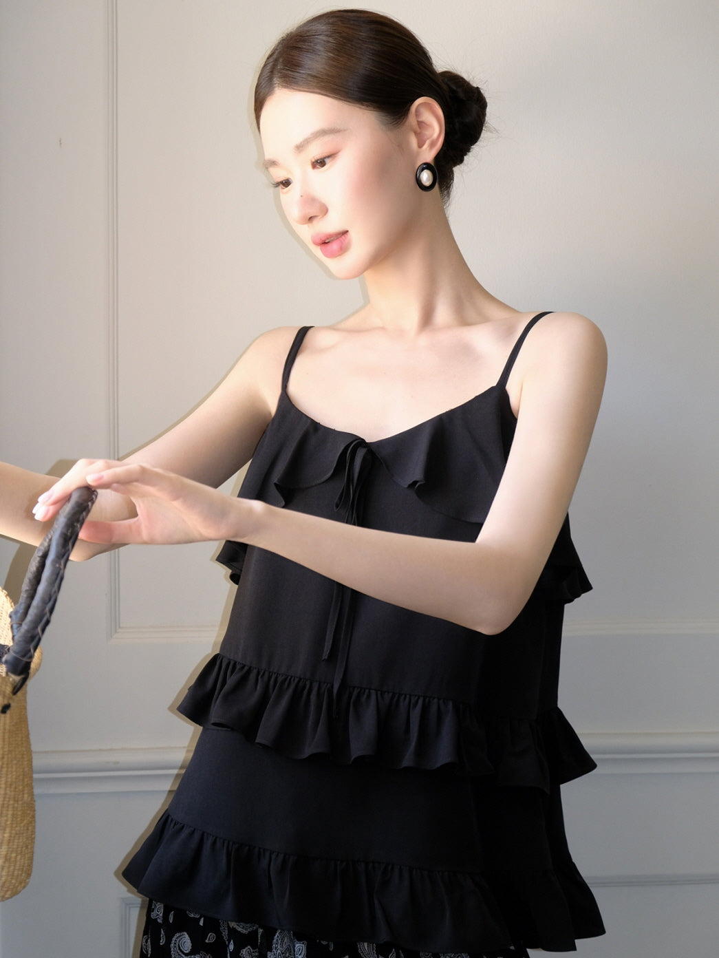 Black ruffled camisole and patterned maxi skirt