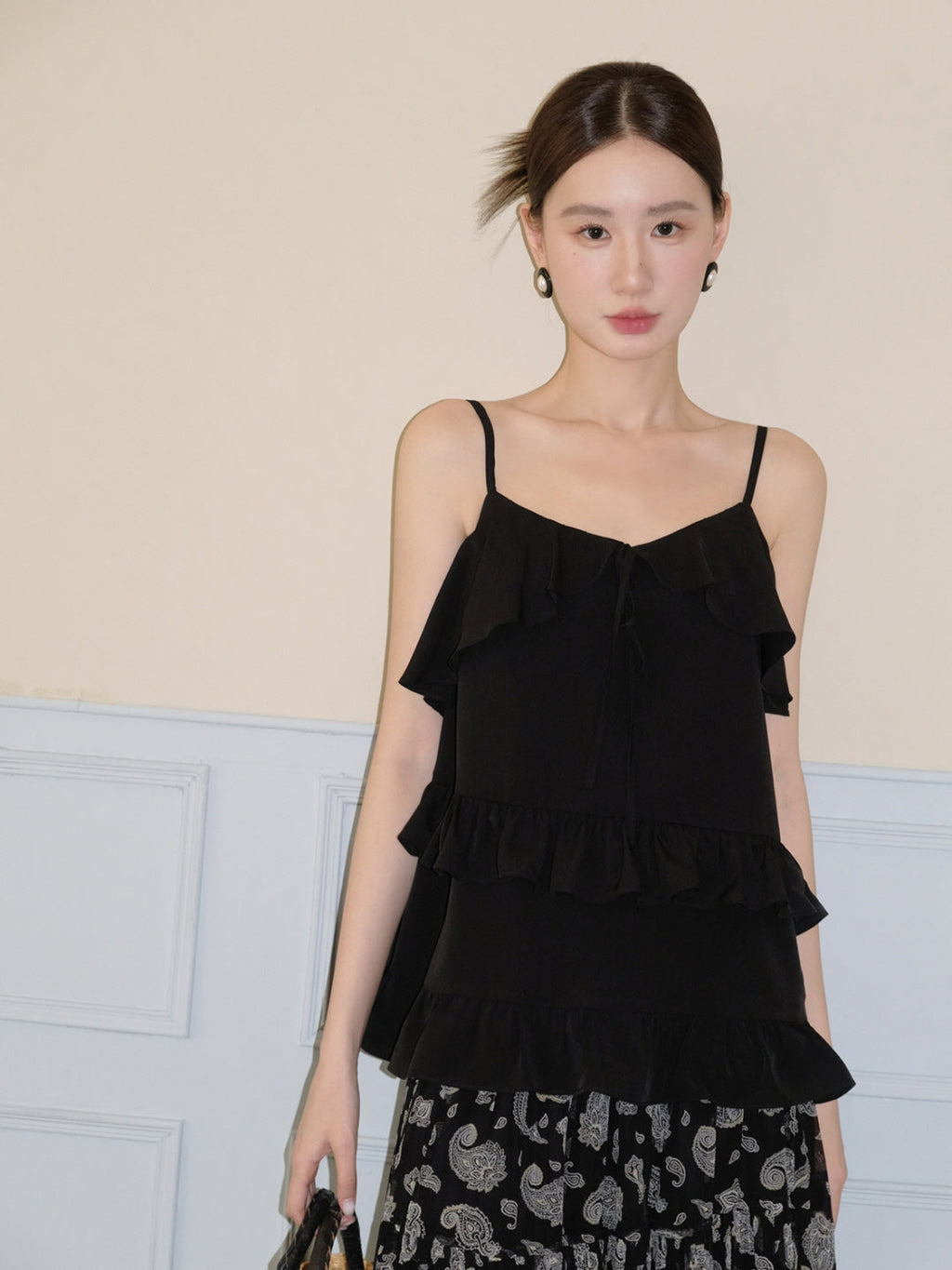 Black ruffled camisole and patterned maxi skirt