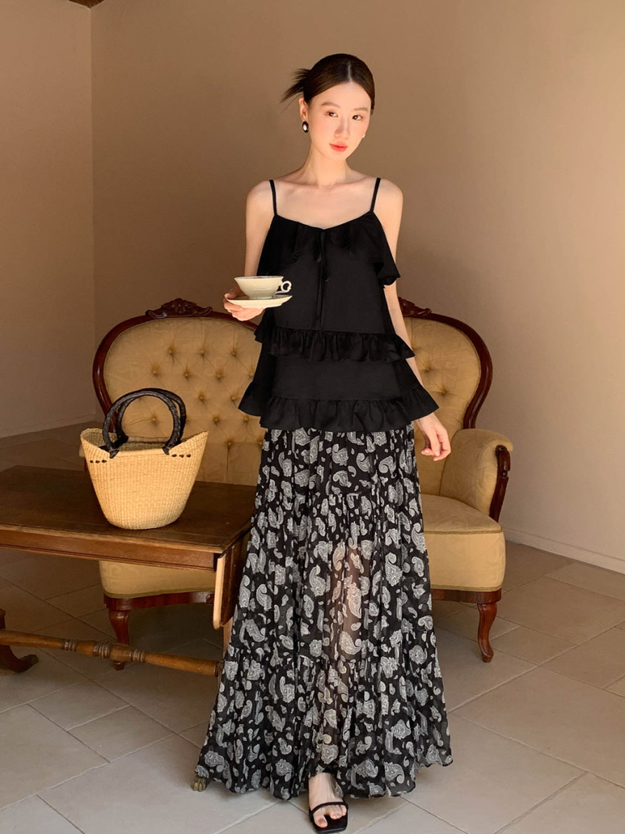 Black ruffled camisole and patterned maxi skirt